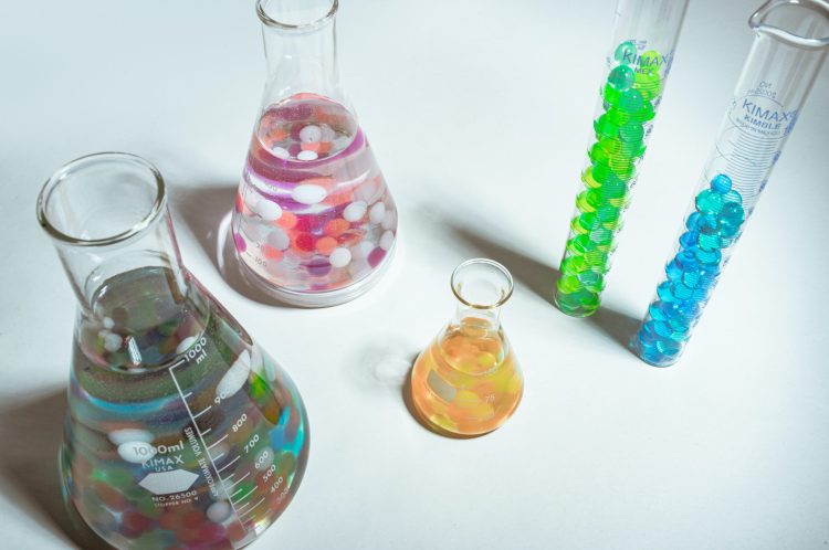 Beakers representing quantifying marketing metrics